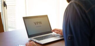 The Dangers of Illegal Streaming: How Pirate Sites Lure Consumers Laptop screen with VPN connecting shown