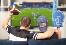 Super Bowl LVIII: All Your Streaming Options A father and son watching the Super Bowl on TV at home.