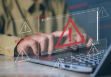 Spotting the Red Flags of Illegal Sports Streaming Websites Warning signs scattered around an image of a man's hands on a computer.