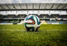 Results for 2022 FIFA World Cup and Preparing for 2026 Up close of a soccer ball on the grass of a stadium