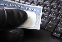 Identity Theft: Recommendations A black gloved hand holding a social security card