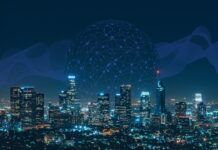 Understanding the Role of Internet Service Providers (ISPs) in Digital Piracy Modern city skyline with tall skyscrapers under a night blue sky